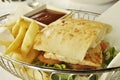 Fish burger with chips Royalty Free Stock Photo