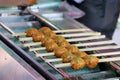 Fish Cake ball through with bamboo grill