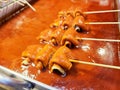 Fish Cake skewer (Eomuk ) with spicy sauce.