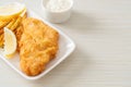 fish and chips - fried fish fillet with potatoes chips Royalty Free Stock Photo
