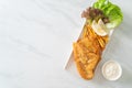 Fish and chips - fried fish fillet with potatoes chips Royalty Free Stock Photo