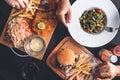 Fish and Chips, Fries and Burger, Pasta Dish on Restaurant Table Royalty Free Stock Photo