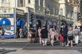 Fish chips and ice cream shops with holidaymakers crossing the street to enjoy. Royalty Free Stock Photo