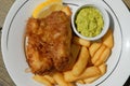 Fish, chips and mushy peas, traditional British meal Royalty Free Stock Photo