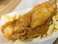 Fish and chips on a paper tray Royalty Free Stock Photo