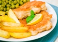 Fish and chips with peas Royalty Free Stock Photo