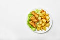 Fish and chips on a plate, white background, top view Royalty Free Stock Photo