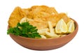 Fish, chips and potato cakes over white Royalty Free Stock Photo