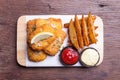 Fish and chips with potato wedge