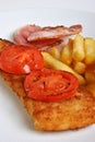 Fish and chips with some tomato