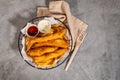 Fish and Chips with tater sauce Royalty Free Stock Photo