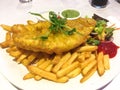 Fish and Chips on white plate Royalty Free Stock Photo