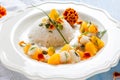 Fish in citrus sauce with rice. Royalty Free Stock Photo