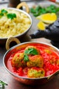 Fish croquette in tomato sauce in a copper bowl Royalty Free Stock Photo
