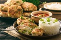 Fish cutlets with broccoli served with boiled rice. Royalty Free Stock Photo