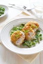 Fish cutlets with green peas and beans Royalty Free Stock Photo