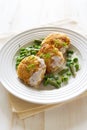 Fish cutlets with green peas and beans Royalty Free Stock Photo