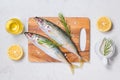 Fish dish cooking with various ingredients. Fresh raw fish decor Royalty Free Stock Photo