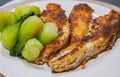 Fish dish, fried fish fillet with vegetables on white plate. Grilled Fish Fillet with green Vegetables. Tasty baked fish Royalty Free Stock Photo