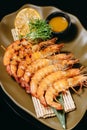 Fish dish langoustines from Hosper with lemon and sause Royalty Free Stock Photo