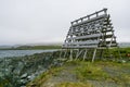 A fish dryer and a hut in Berlevag dock Royalty Free Stock Photo