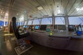 Fish-eye shot of modern wheelhouse navigation bridge