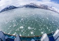 Fish Eye View of Floating Icebergs and Mountains