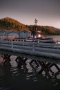 A fish factory kind environment at sunrise, illustrated in 3D