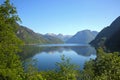 Fish farm in Hardangerfjord, in a beautiful fjord environment, with reflections of the mountains, Rosendal, Norway Royalty Free Stock Photo