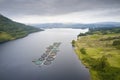 Fish farm salmon round nets in natural environment Loch Awe Arygll and Bute Scotland Royalty Free Stock Photo