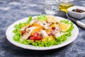 Fish fillet with raw vegetables Royalty Free Stock Photo