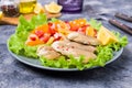 Fish fillet with raw vegetables