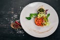 Fish fillet with spinach sauce and steam vegetables.