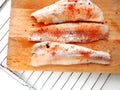 Fish fillet on wooden background