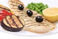 Fish fillets with vegetables on barbecue. Royalty Free Stock Photo