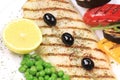 Fish fillets with vegetables on barbecue Royalty Free Stock Photo