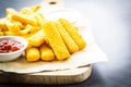 Fish finger and french fries or chips with tomato ketchup and mayonnaise sauce Royalty Free Stock Photo