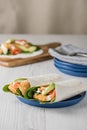 Fish finger wraps with avocado and tomato Royalty Free Stock Photo