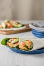 Fish finger wraps with avocado and tomato Royalty Free Stock Photo
