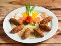 fish fingers served on a ceramic white plate, selective focus Royalty Free Stock Photo