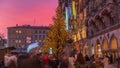 Fish Fountain, Fischbrunnen in front of the New New Town Hall at Marienplatz day to night transition timelapse in Munich Royalty Free Stock Photo