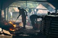 Fish frying on the streets in Bagamoyo. Local people frying fish on the local fish market in Bagamoyo, Tanzania, East