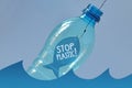 Fish on a hook with the written Stop plastic! in a plastic bottle floating on water - Concept of ecology and stop plastic