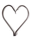 Fish hooks in heart shape Royalty Free Stock Photo