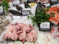 Fish with ice in a market with swordfish, amberjack and squid Royalty Free Stock Photo
