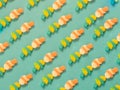 Fish jelly candies kissing pattern on green