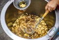 Fish maw soup in a large pot made for sale in the traditional Chinese market of Ban Chak Ngaew