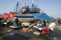 Fish mongers at work at the busy fishing port of Essaouira on the west coast of Morocco. Royalty Free Stock Photo