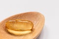 Fish oil capsule in the spoon is nutrition food for healthy. Royalty Free Stock Photo