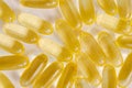 Fish oil capsules close up.